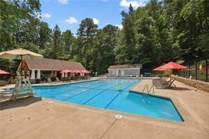 pool with a patio area