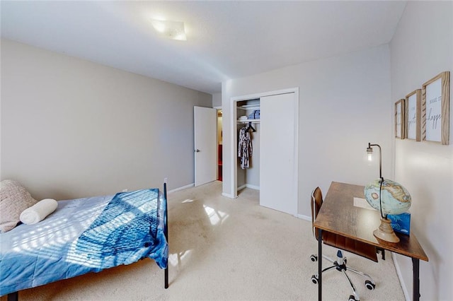 carpeted bedroom featuring a closet