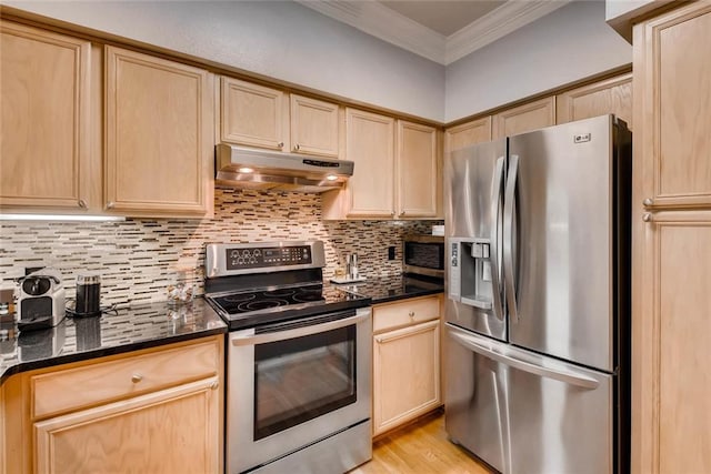 kitchen featuring light brown cabinetry, tasteful backsplash, dark stone counters, ornamental molding, and stainless steel appliances