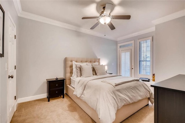 bedroom with crown molding, light colored carpet, and ceiling fan