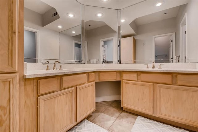 bathroom featuring vanity and tile patterned flooring