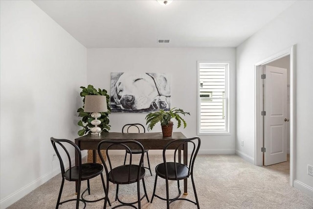 view of carpeted dining room