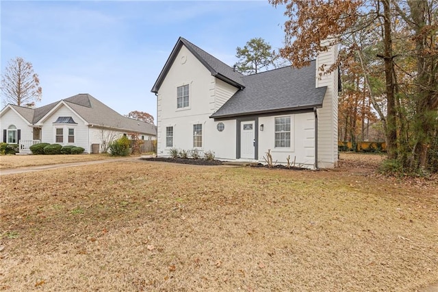 view of property with a front lawn