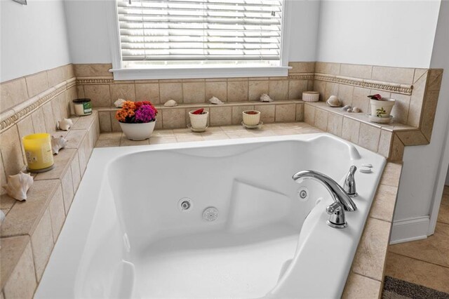 full bathroom featuring a whirlpool tub