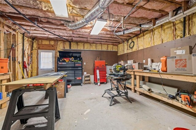 basement featuring a workshop area