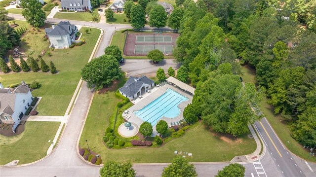aerial view of property's location with a pool