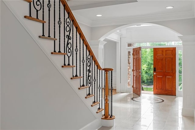 130 Robin Rd, Marietta, GA 30067 - entrance foyer featuring ornamental molding, arched walkways, recessed lighting, and stairs