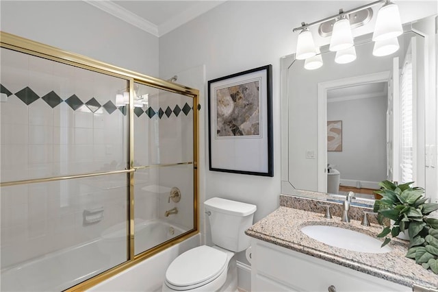 130 Robin Rd, Marietta, GA 30067 - bathroom featuring toilet, crown molding, vanity, and enclosed tub / shower combo