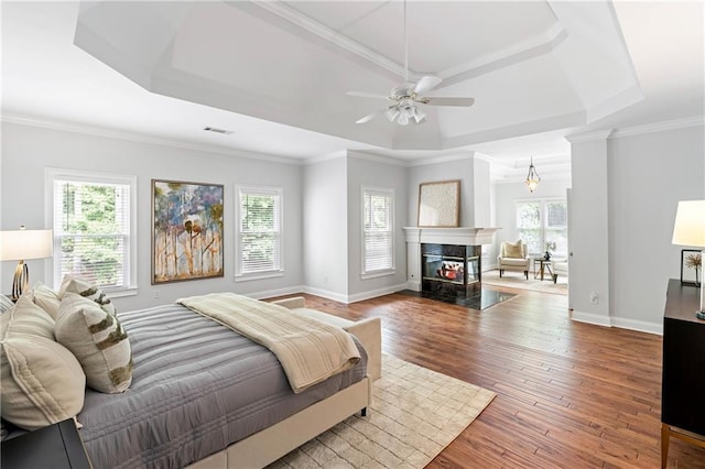 130 Robin Rd, Marietta, GA 30067 - bedroom featuring a tray ceiling, wood-type flooring, baseboards, and crown molding