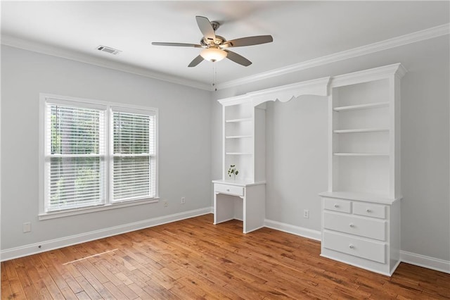 130 Robin Rd, Marietta, GA 30067 - unfurnished bedroom with light wood-style flooring, baseboards, crown molding, and a ceiling fan