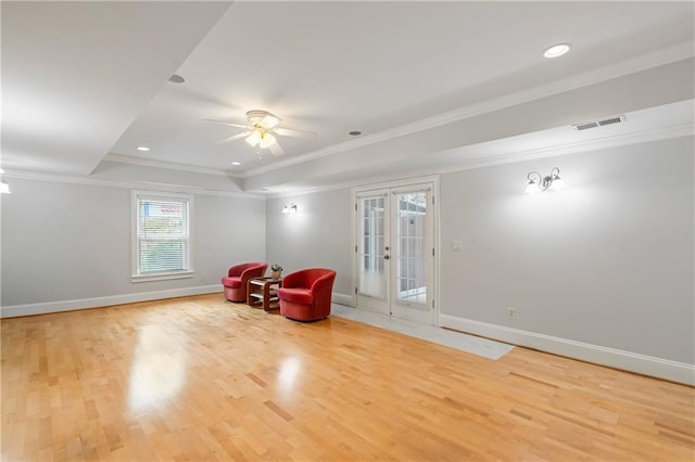 130 Robin Rd, Marietta, GA 30067 - unfurnished room with a tray ceiling, baseboards, light wood-style floors, ornamental molding, and ceiling fan