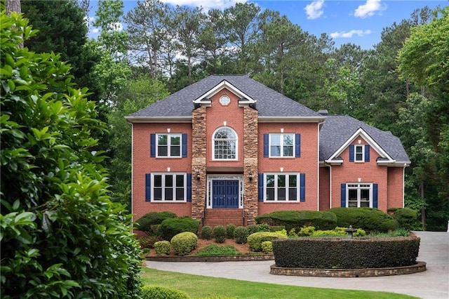 130 Robin Rd, Marietta, GA 30067 - colonial home featuring brick siding and a shingled roof