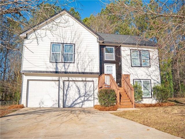 raised ranch featuring a garage