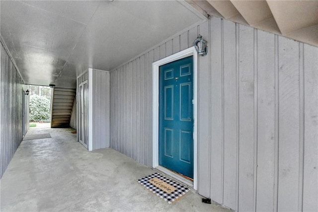 entrance to property featuring board and batten siding