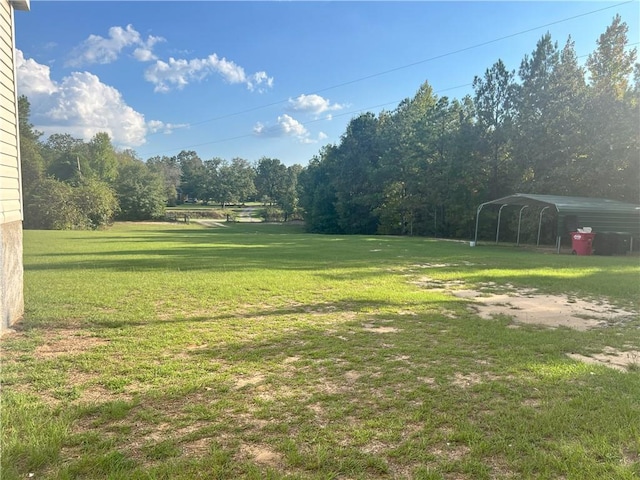 view of yard featuring a carport