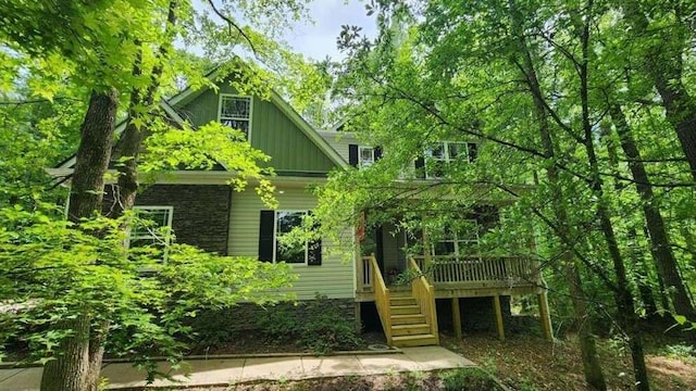 exterior space featuring a wooden deck