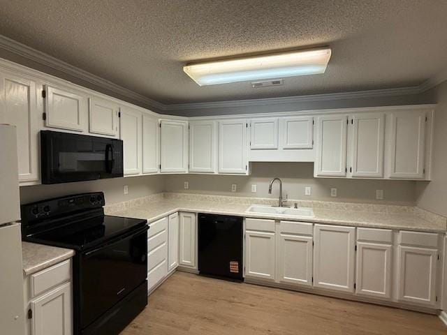 363 Mount Vernon Dr, Calhoun, GA 30701 - kitchen featuring black appliances, a sink, ornamental molding, white cabinets, and a textured ceiling