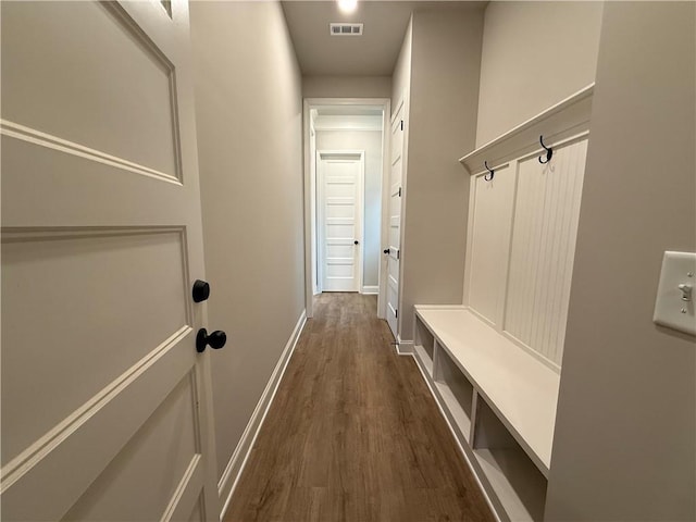 mudroom with dark hardwood / wood-style flooring