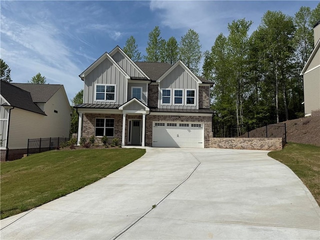 craftsman house with board and batten siding, an attached garage, driveway, and fence