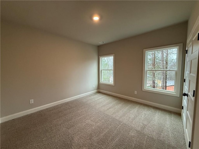 view of carpeted spare room