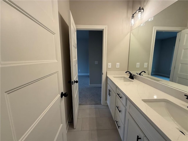 bathroom with vanity and tile patterned flooring