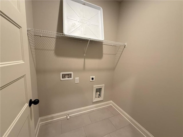 washroom featuring washer hookup, tile patterned flooring, and hookup for an electric dryer