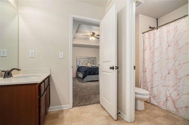 bathroom featuring visible vents, a shower with shower curtain, toilet, ceiling fan, and vanity