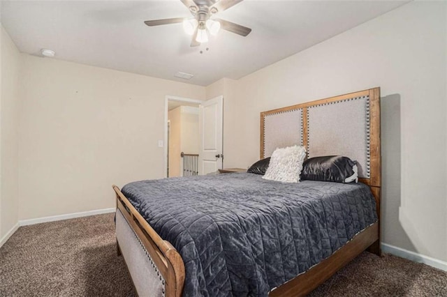 bedroom with carpet, baseboards, and a ceiling fan