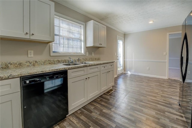 kitchen featuring sink, dark wood-type flooring, black appliances, white cabinets, and light stone countertops