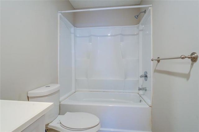 full bathroom with toilet, vanity, and shower / tub combination