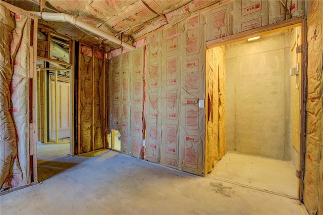 miscellaneous room with concrete flooring