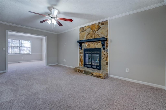 unfurnished living room featuring a fireplace, crown molding, carpet, and ceiling fan