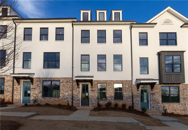 5448 Howington Ct E Unit 194, Buford, GA 30518 - townhome / multi-family property with brick siding