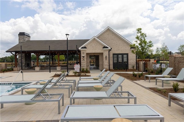 5448 Howington Ct E Unit 194, Buford, GA 30518 - community pool with a patio, french doors, and a gazebo