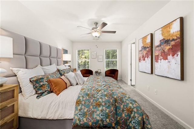 bedroom with light carpet and ceiling fan