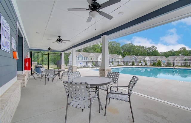 view of pool featuring a patio area and ceiling fan