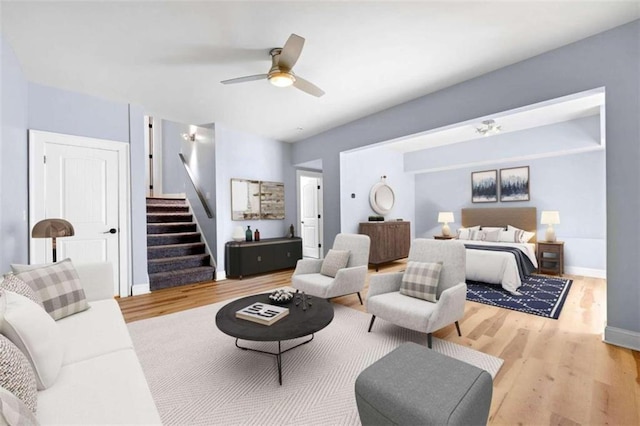 bedroom with ceiling fan and wood-type flooring