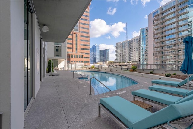 view of pool with a patio