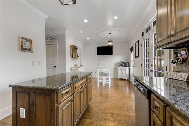 735 Neel Reid Dr, Roswell, GA 30075 - kitchen with stainless steel dishwasher, french doors, baseboards, recessed lighting, and wood finished floors