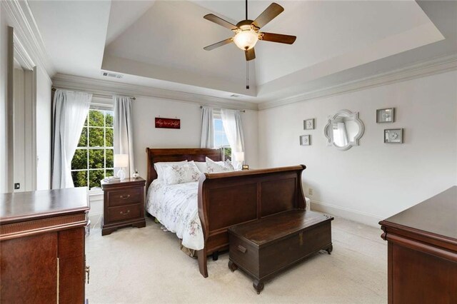 735 Neel Reid Dr, Roswell, GA 30075 - bedroom featuring a ceiling fan, visible vents, light carpet, and a tray ceiling