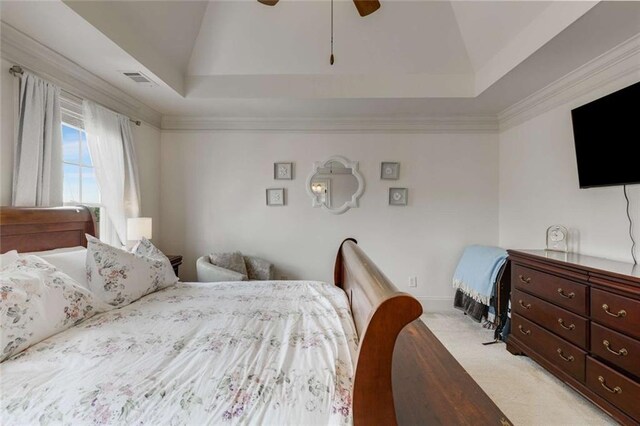 735 Neel Reid Dr, Roswell, GA 30075 - bedroom featuring light colored carpet, vaulted ceiling, visible vents, a raised ceiling, and a ceiling fan