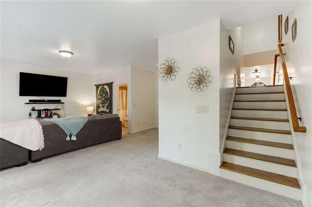 735 Neel Reid Dr, Roswell, GA 30075 - carpeted living room featuring baseboards and stairway