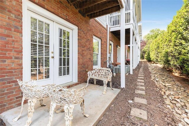735 Neel Reid Dr, Roswell, GA 30075 - view of patio featuring french doors and a balcony