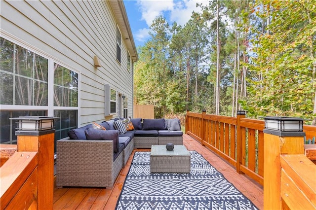 wooden deck featuring outdoor lounge area