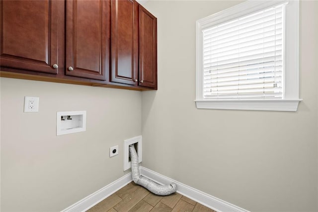 29 Lankford Rd, Tucker, GA 30084 - laundry room featuring hookup for an electric dryer, baseboards, cabinet space, washer hookup, and wood finished floors