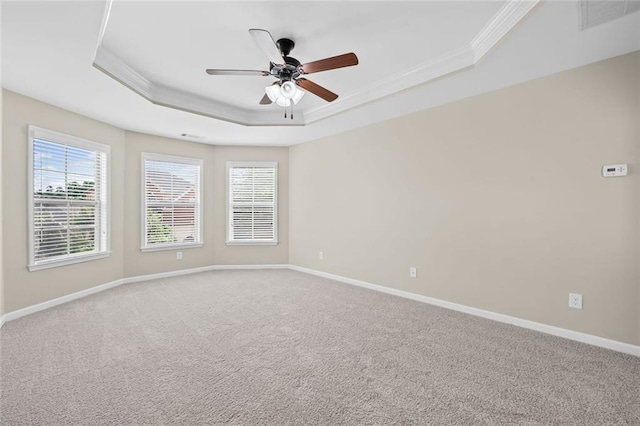 29 Lankford Rd, Tucker, GA 30084 - empty room featuring crown molding, a raised ceiling, a ceiling fan, baseboards, and plenty of natural light