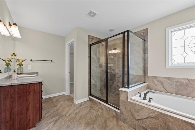 29 Lankford Rd, Tucker, GA 30084 - bathroom with vanity, a bath, a shower stall, and baseboards