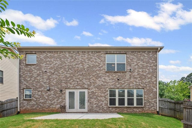 29 Lankford Rd, Tucker, GA 30084 - back of property with a patio and brick siding