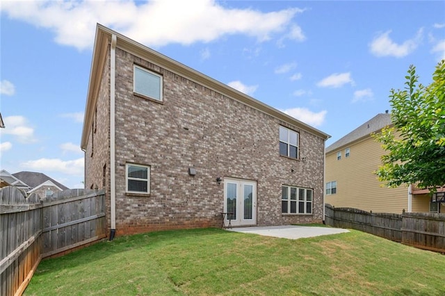 29 Lankford Rd, Tucker, GA 30084 - back of house featuring a patio and brick siding
