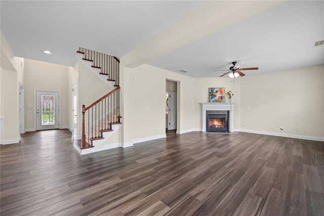 29 Lankford Rd, Tucker, GA 30084 - unfurnished living room featuring stairs, dark wood-style flooring, a ceiling fan, baseboards, and recessed lighting